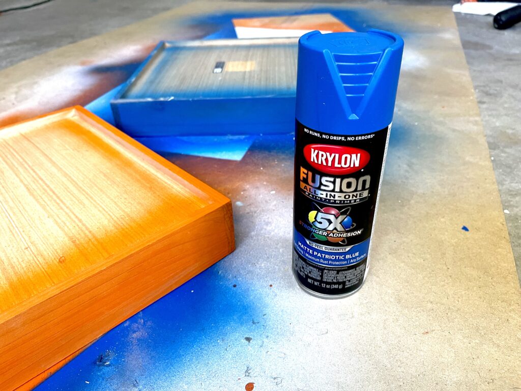 Spray painting a wooden box is as easy as flipping it upside down. No taping necessary. 