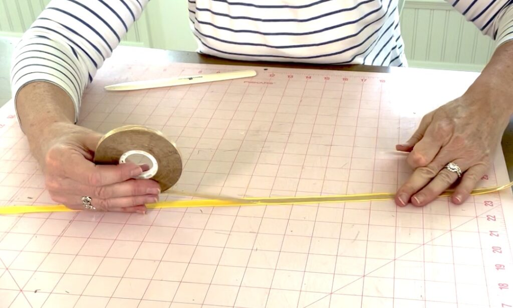 Applying 3M's ATG Adhesive Transfer Tape to ribbon allows crafters to appy ribbon just about anywhere. 