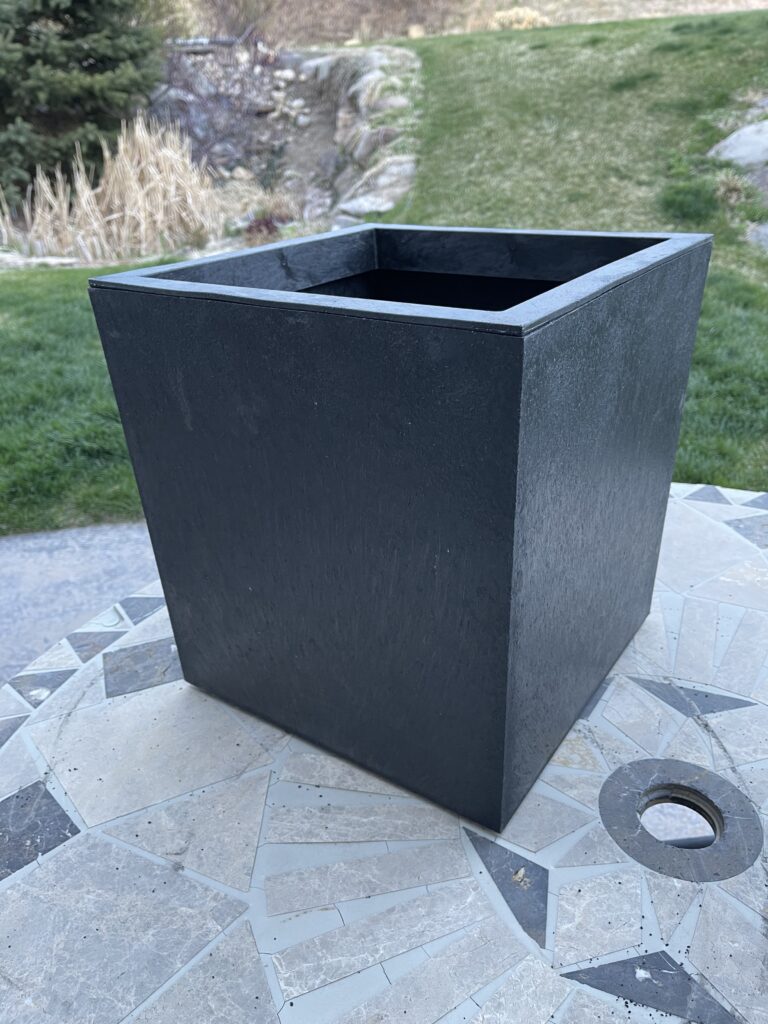 A square planter pot is used to create the base for a large Estate Style Planter.