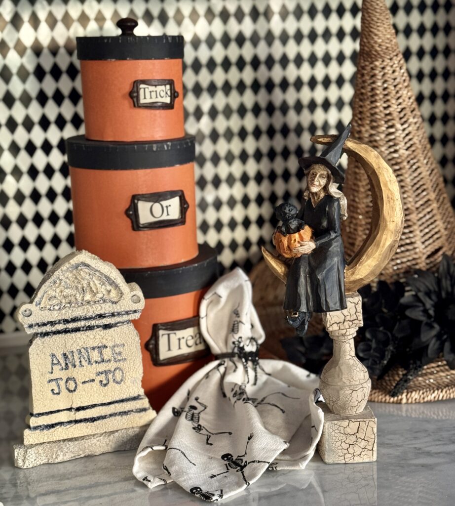 Halloween table top decor, including a faux headstones DIY'd from styrofoam.